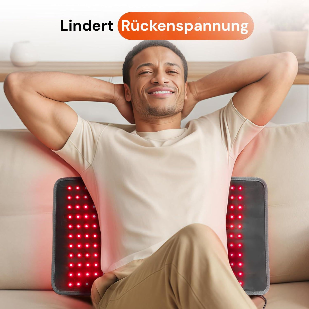 Regain red light mat relieves back tension during relaxed use on the sofa